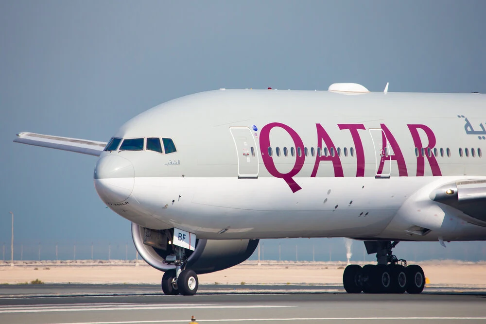 Qatar Airways Boeing 777 taxiing on a runway