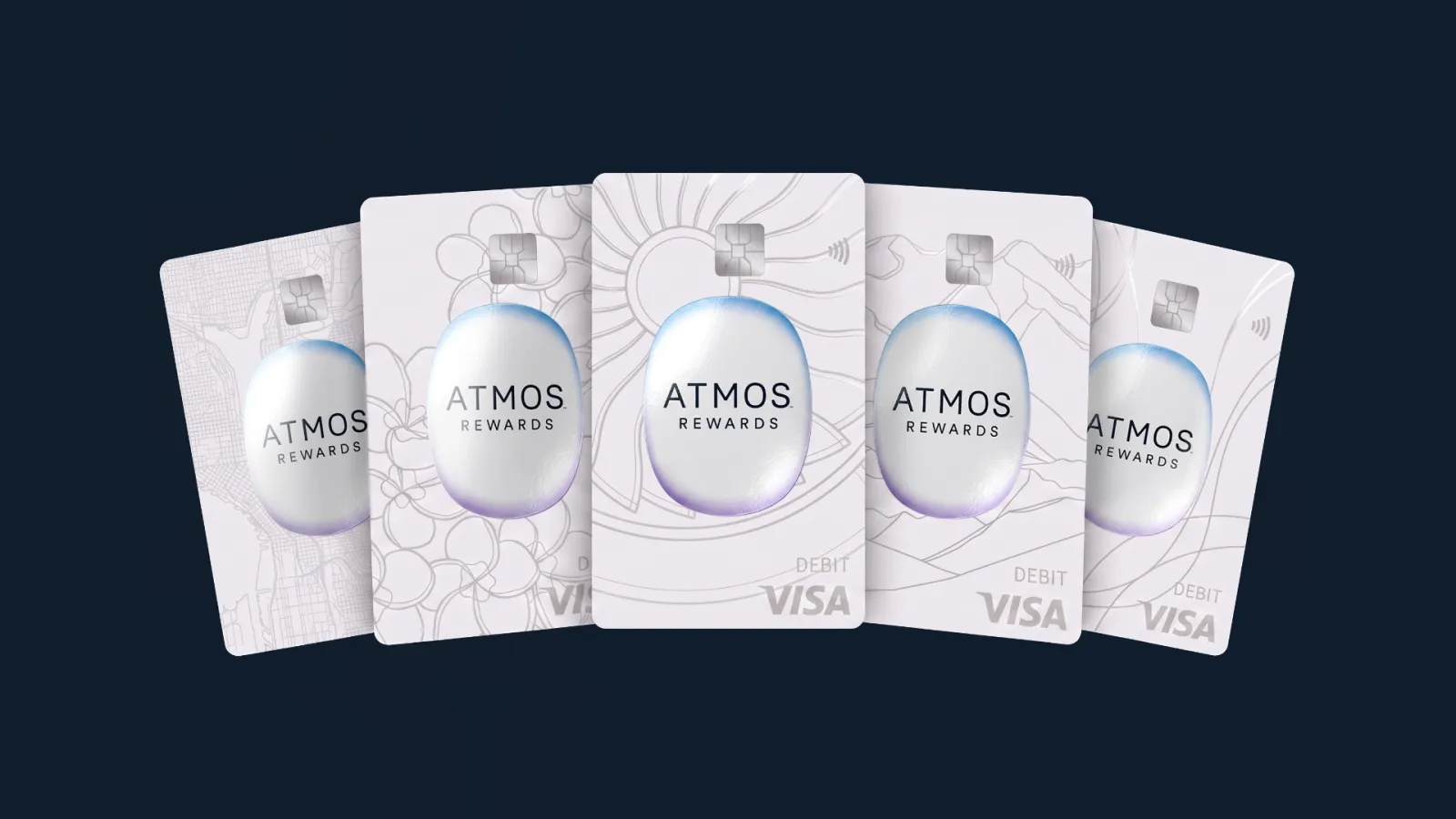 Lineup of five Atmos Rewards Visa debit cards with different artwork designs