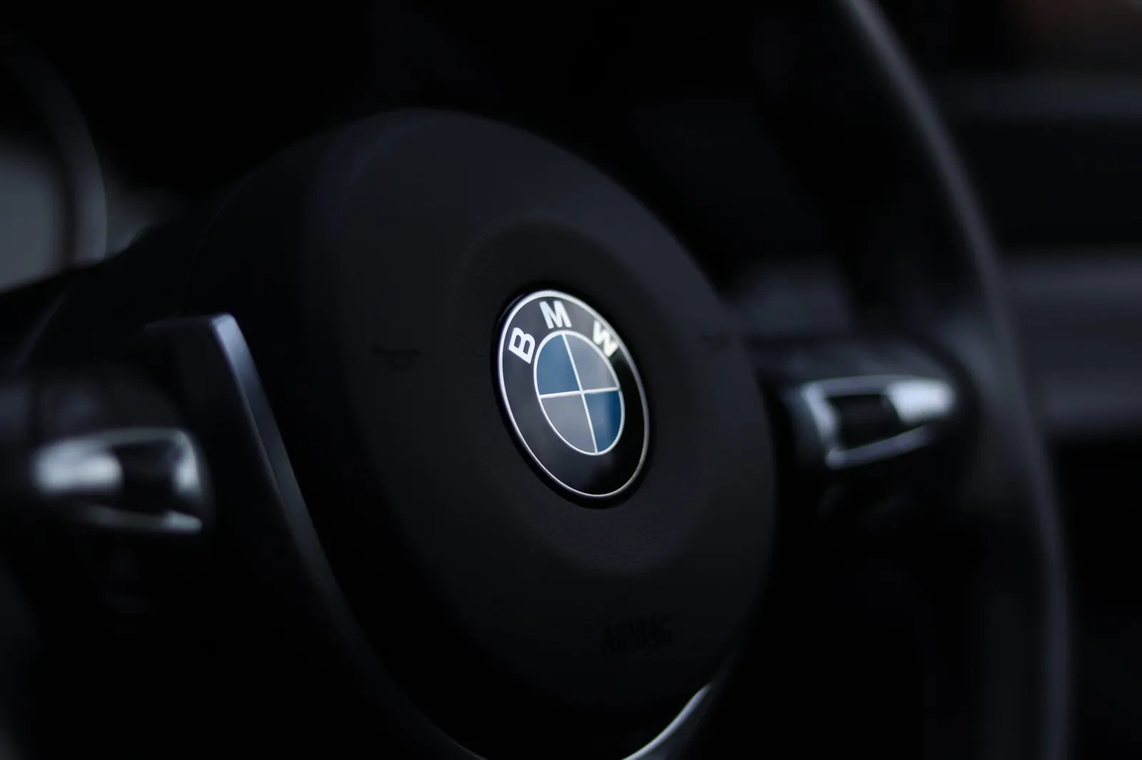 BMW logo on a black steering wheel