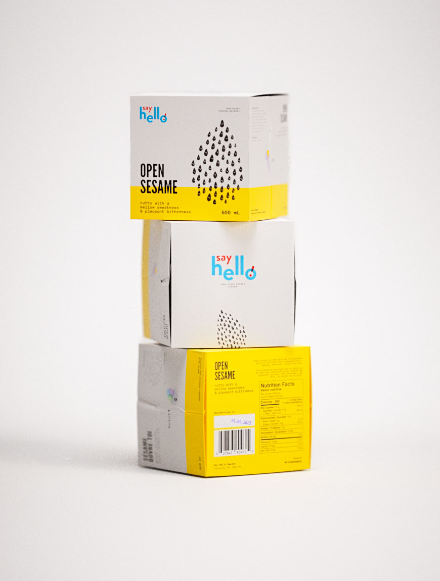 A compact beverage box in bright white and yellow features a cascade of black sesame seed graphics arranged into a stylized tree form. The product title, “OPEN SESAME,” appears in bold uppercase sans serif over a yellow block, with flavor notes described as “nutty with a mild sweetness & pleasant bitterness.” The layout is crisp, and the iconography sharp, drawing on minimalist graphic language. This packaging reflects the work of a packaging design agency focused on graphic reduction, effective hierarchy, and monochromatic identity strategies in modern FMCG branding.