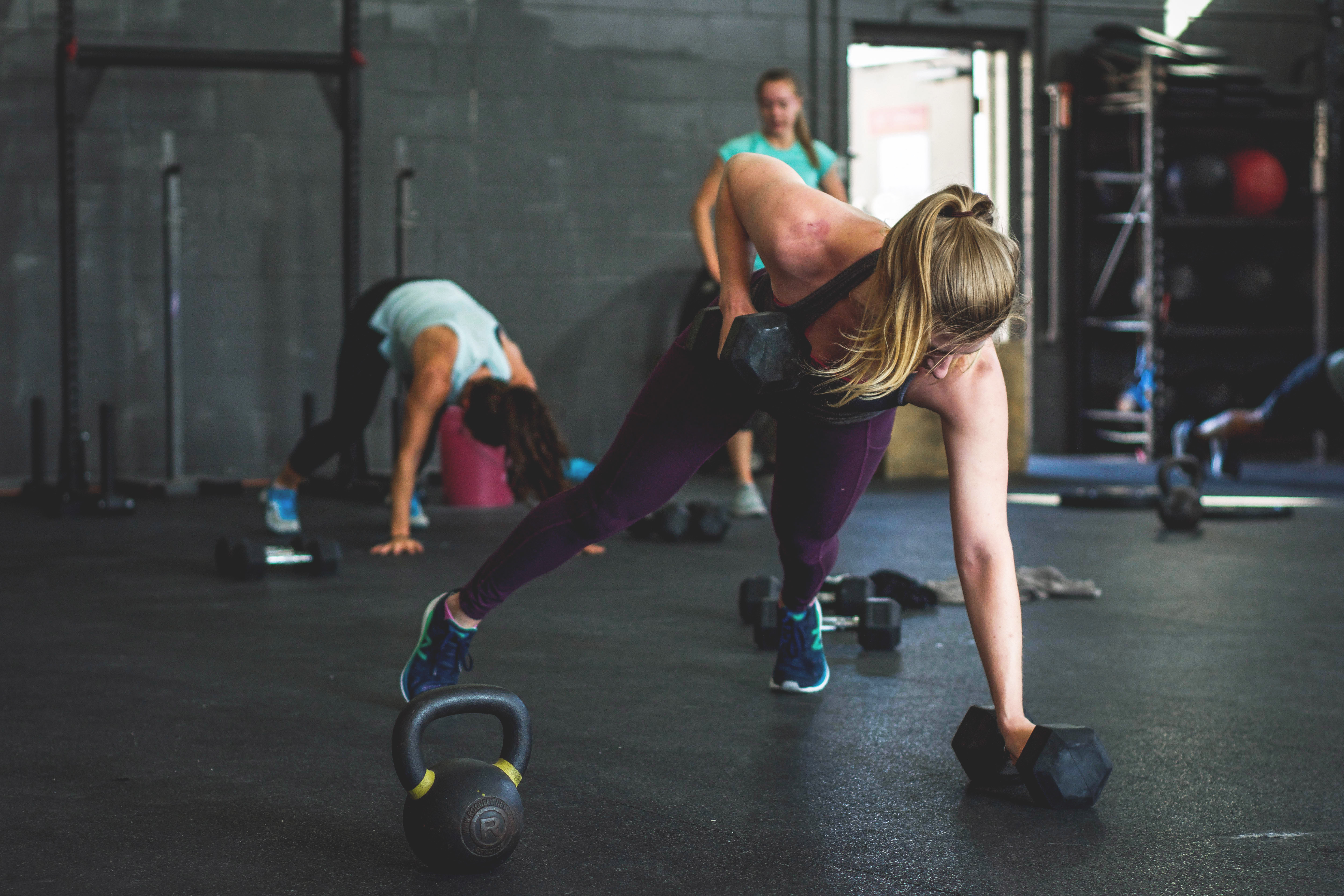 Woman working out with dumbbells