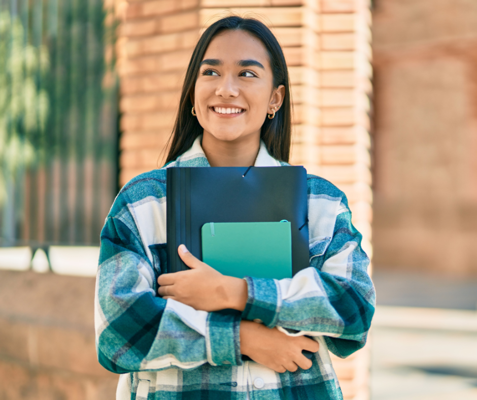 Yessicka and her family. Included in the photo are her husband, child, and pet dog.