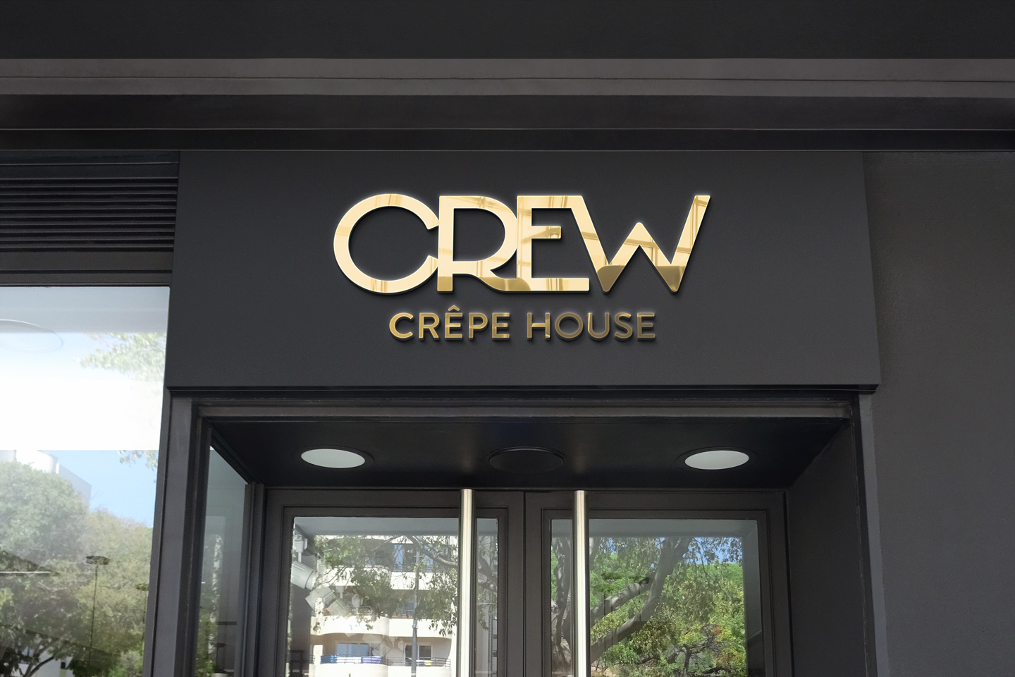 A mockup of the Crew Crepe House logo on restaurant sign
