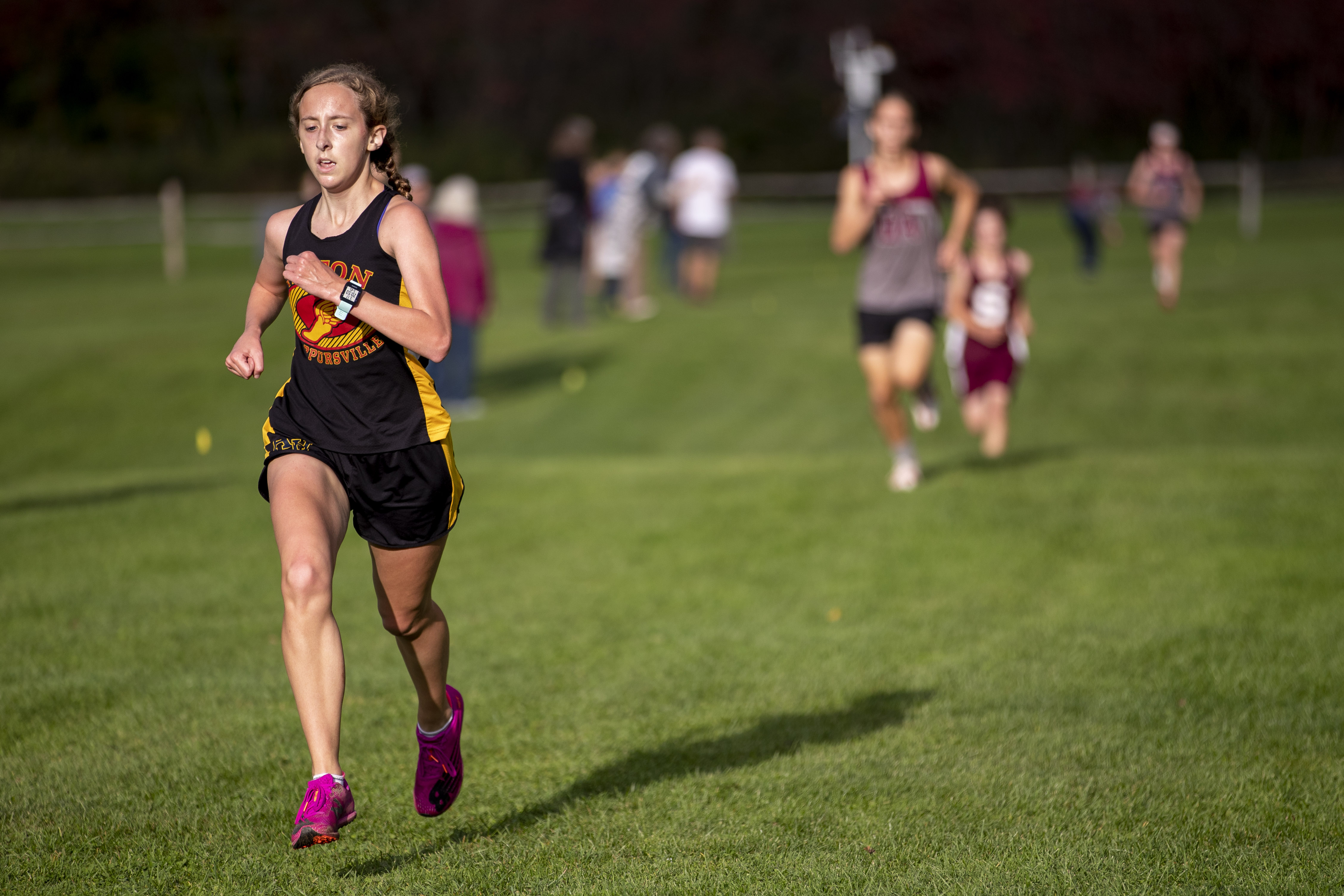 action shot of girl spiking volleyball