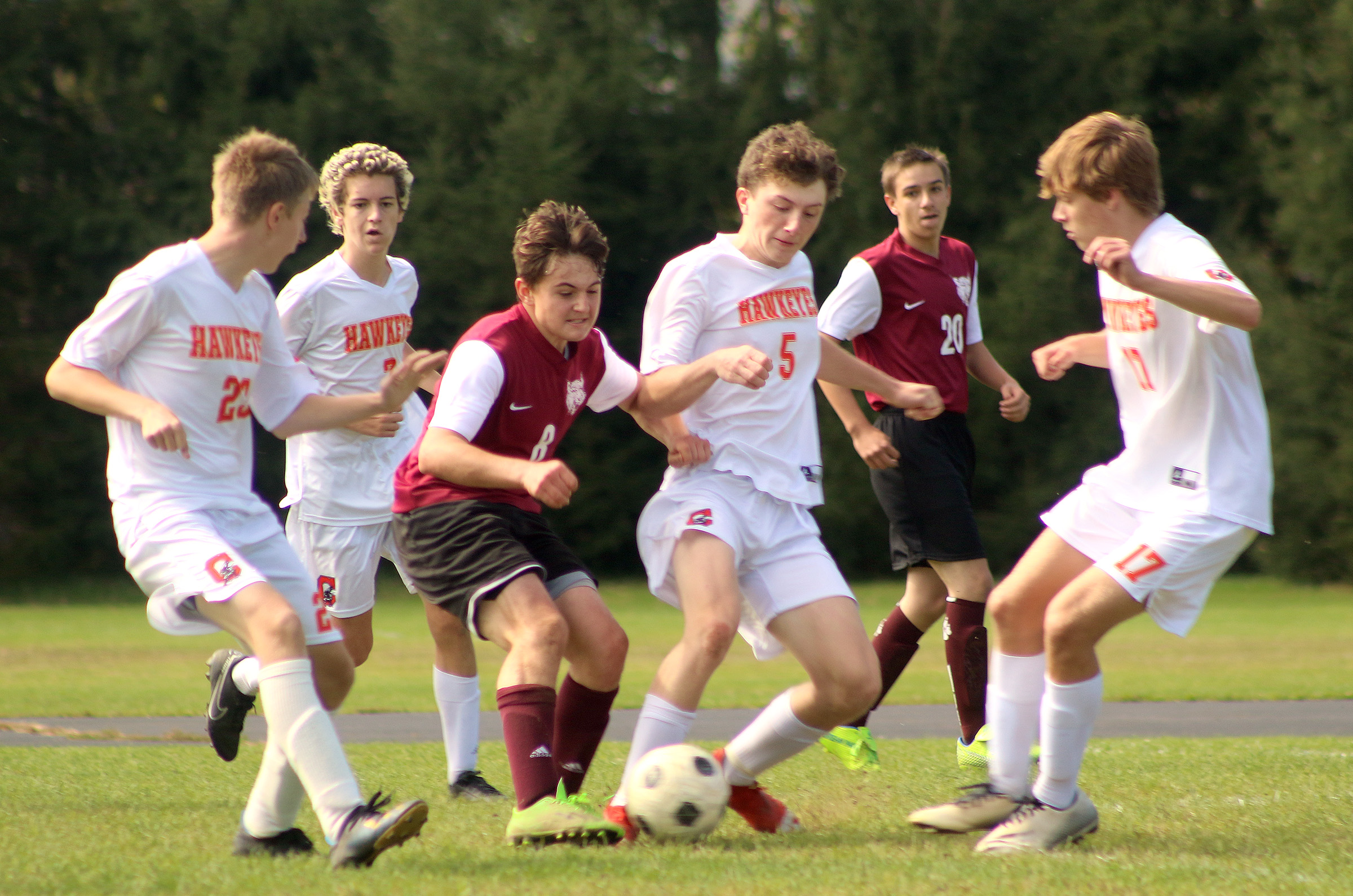 action shot of girl spiking volleyball