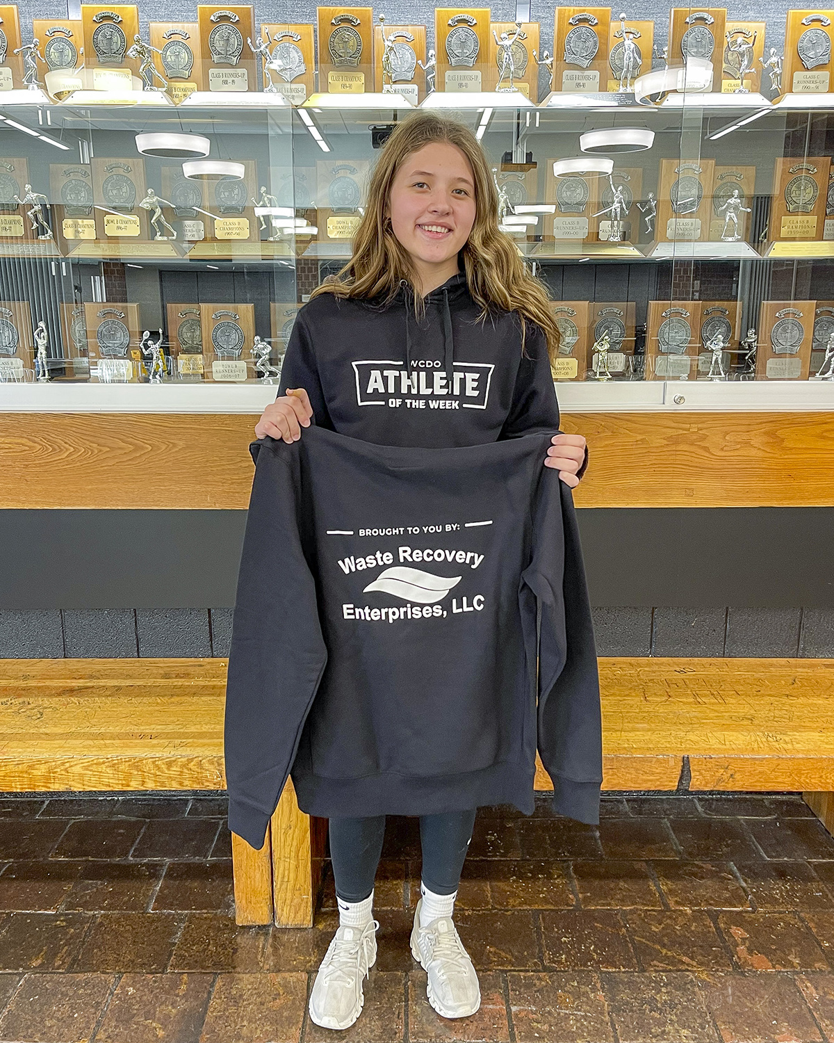 action shot of girl spiking volleyball