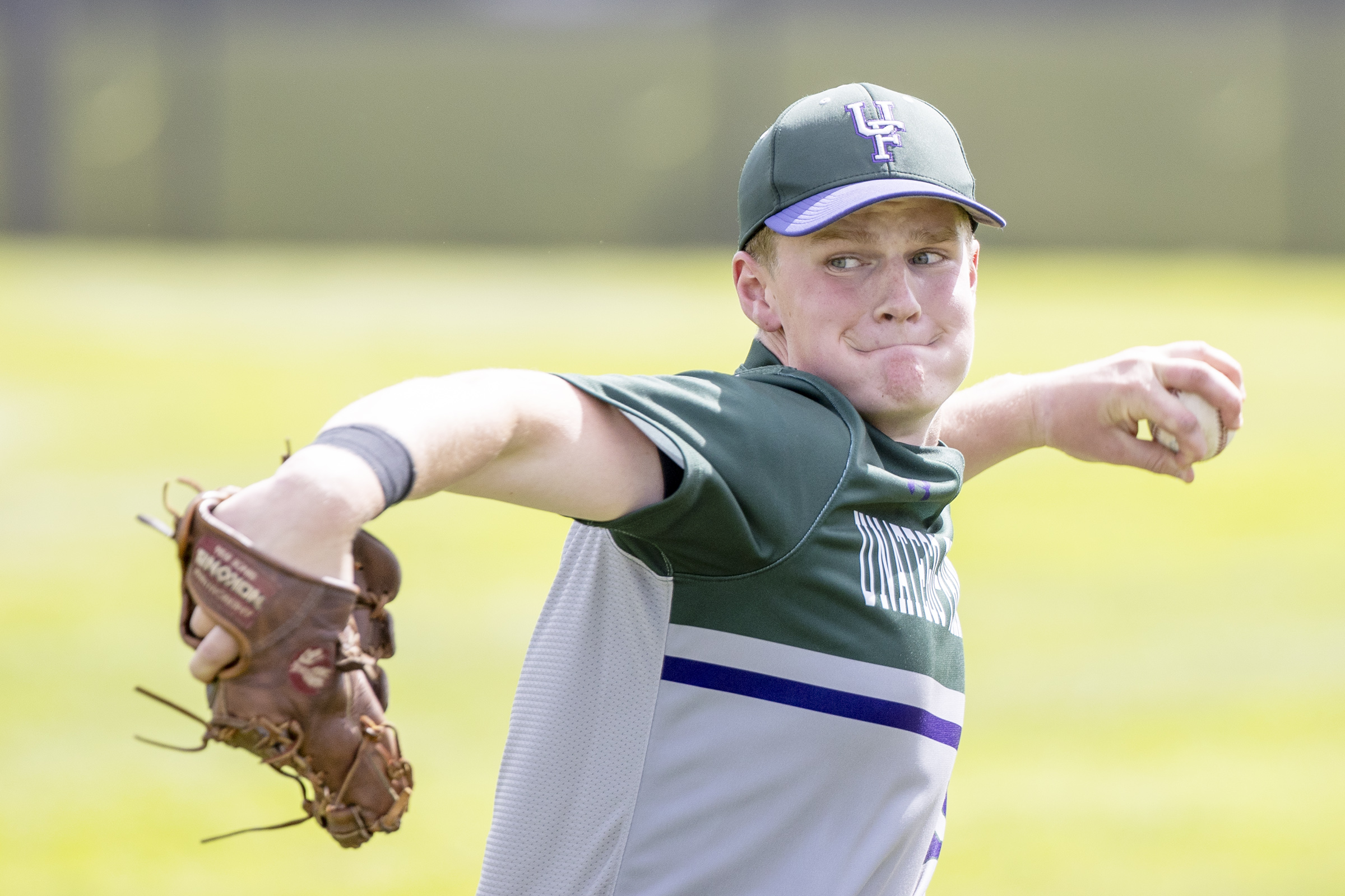action shot of girl spiking volleyball