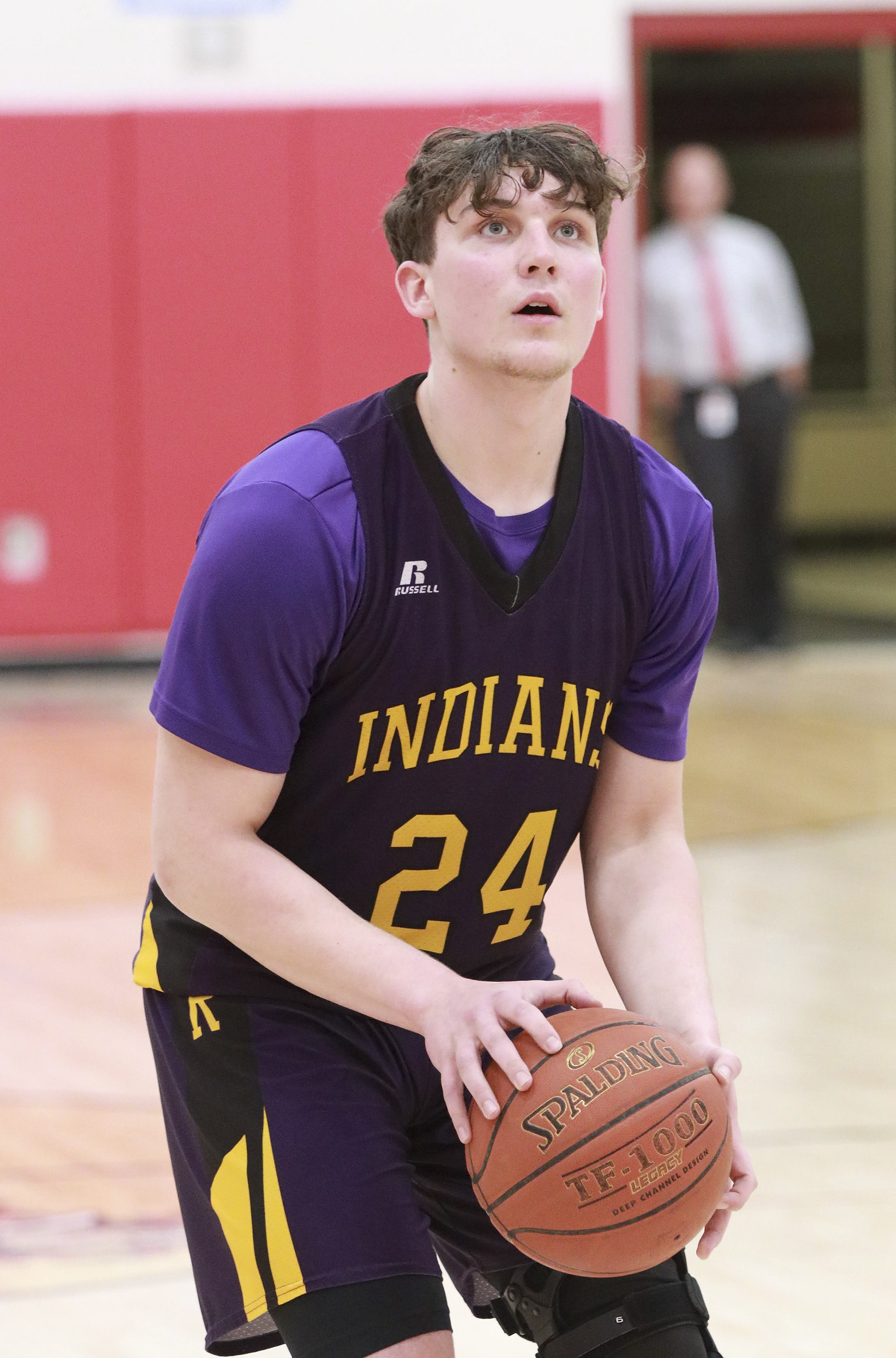 action shot of girl spiking volleyball