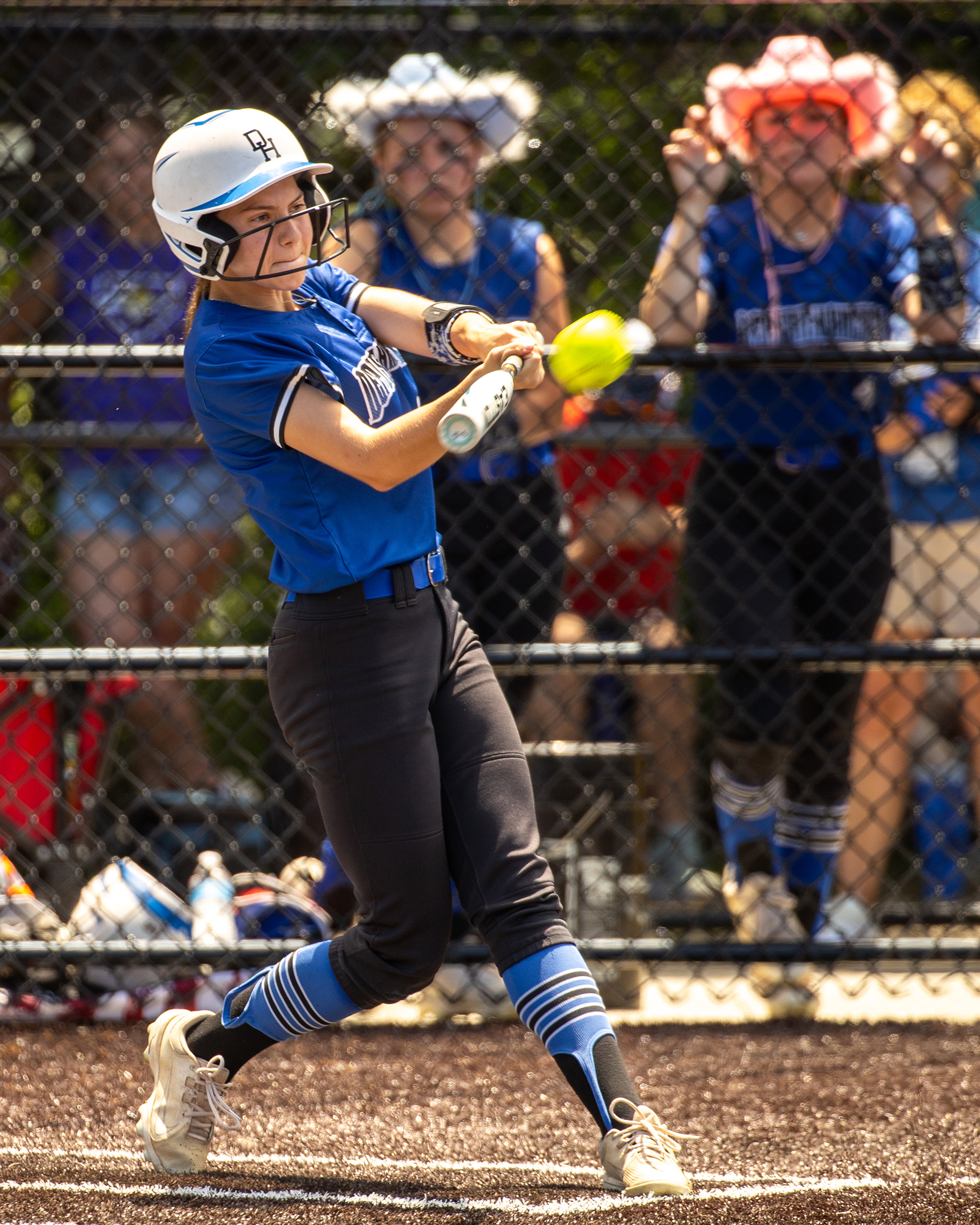 action shot of girl spiking volleyball