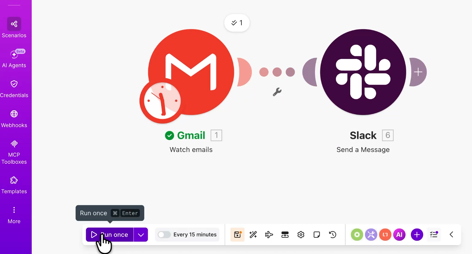 The workflow designer canvas showing a connected flow between Gmail and Slack modules marked with green confirmation checkmarks. A hand icon depresses the purple "Run once" manual execution button in the bottom left toolbar.