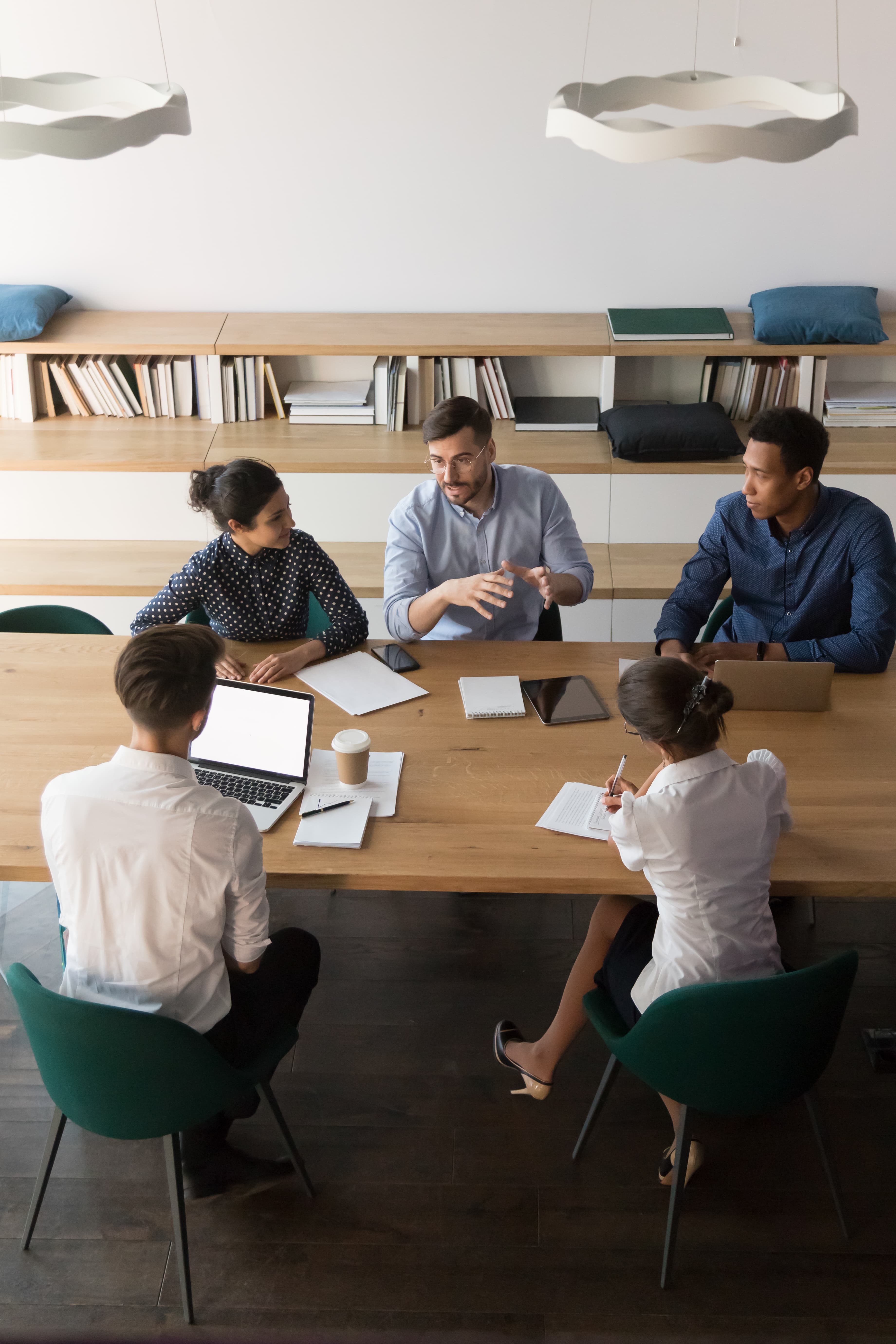 Group of people in meeting.