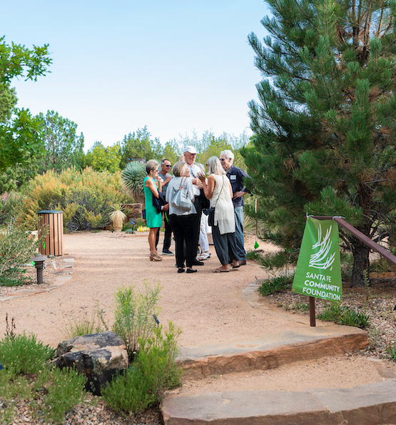 Foundation donors talking together outdoors