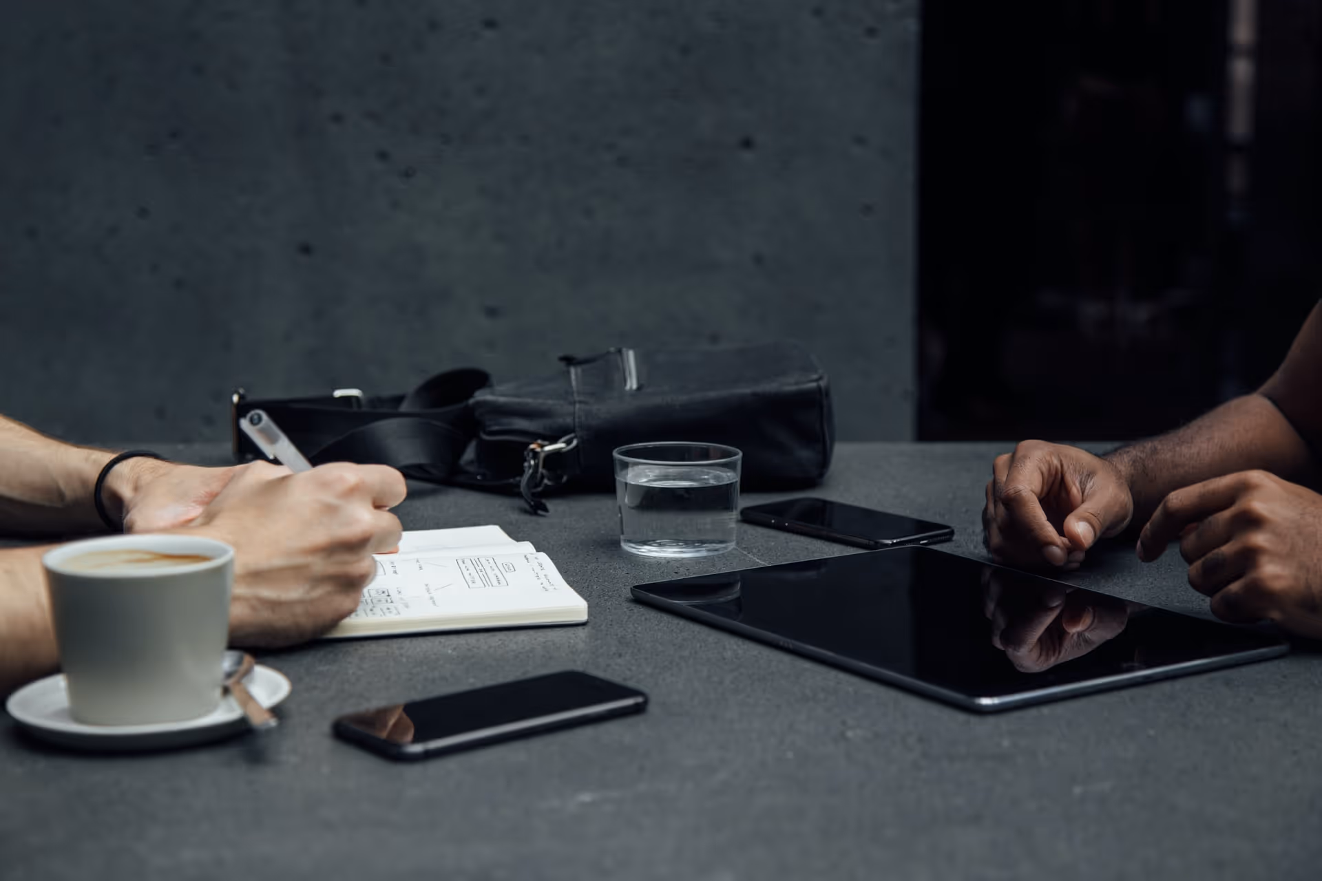 A desk with items used to enhance productivity 