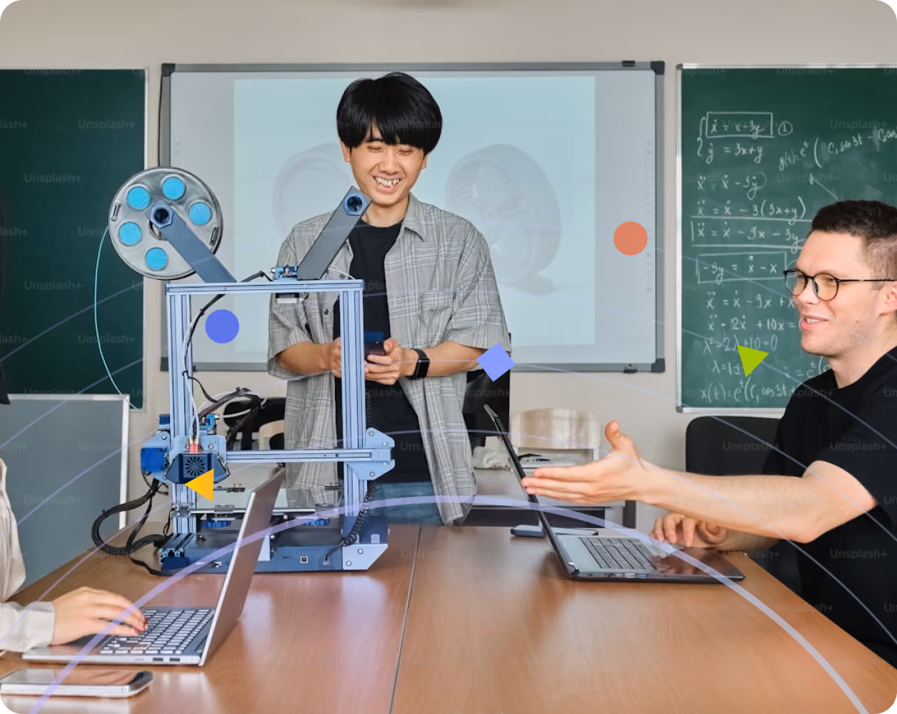 Smiling student presenting a 3D printer project in a classroom with laptops and engineering diagrams—representing the Edge Impulse Student Program for hands-on AI learning.