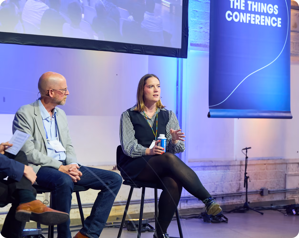 Female speaker sharing insights during a panel discussion, representing student leadership in AI as part of the Edge Impulse Campus Ambassador Program.