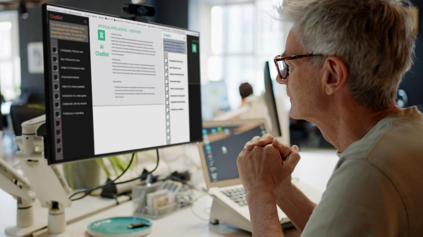 A person looking at a computer screenAI-generated content may be incorrect.