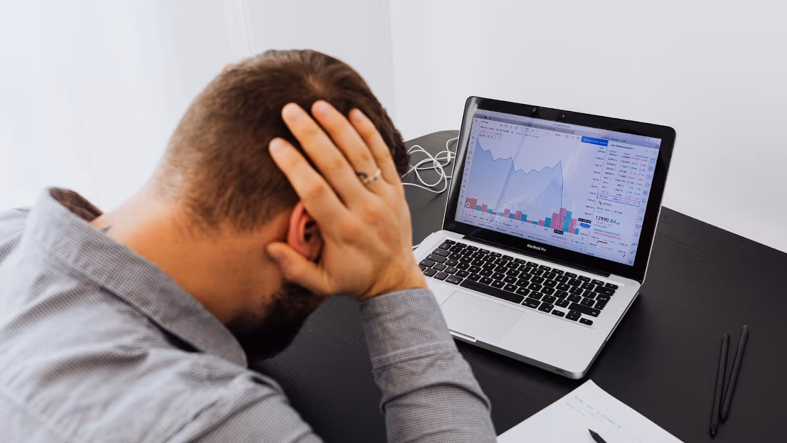 Man overworked in front of laptop