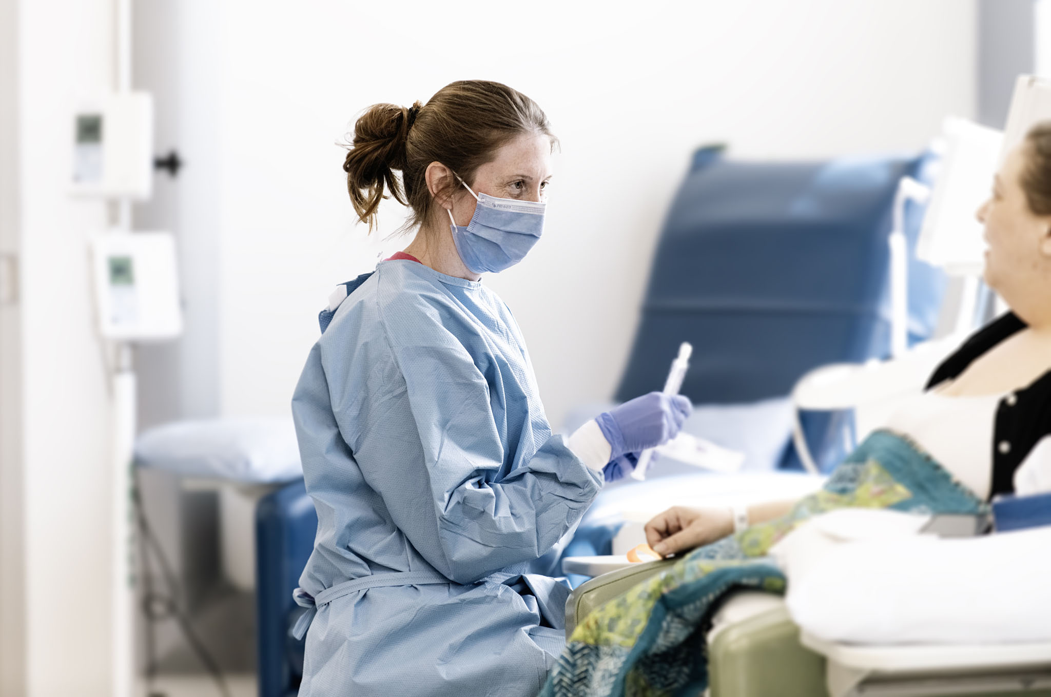 Nurse caring for patient in Systemic Therapy (Chemotherapy)