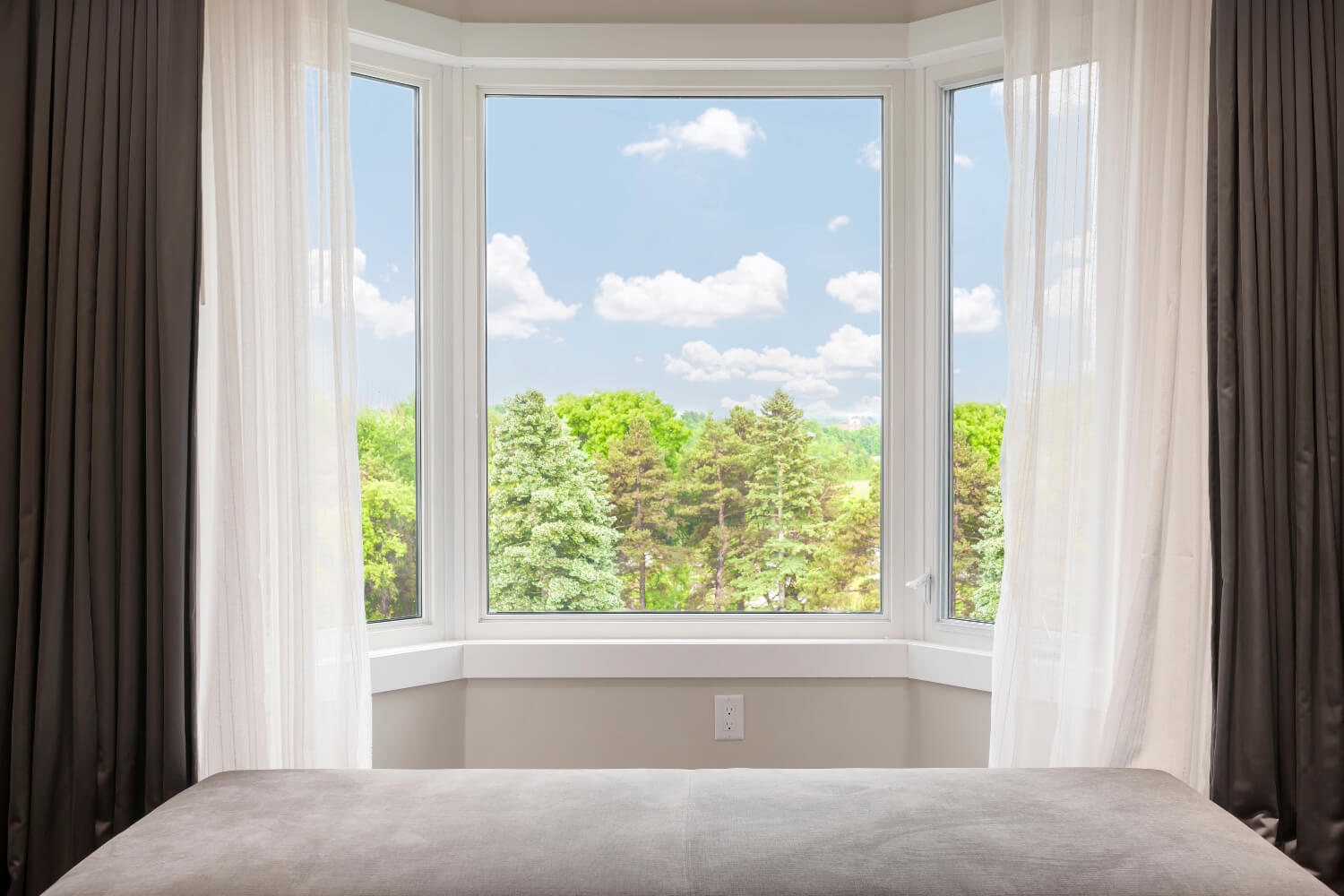 Bay window with curtains in San Antonio.