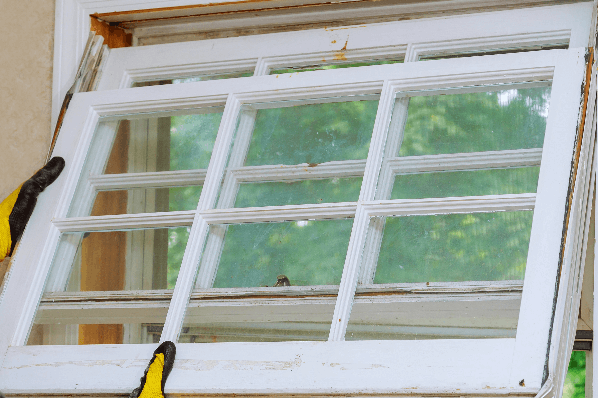 Person replacing window.