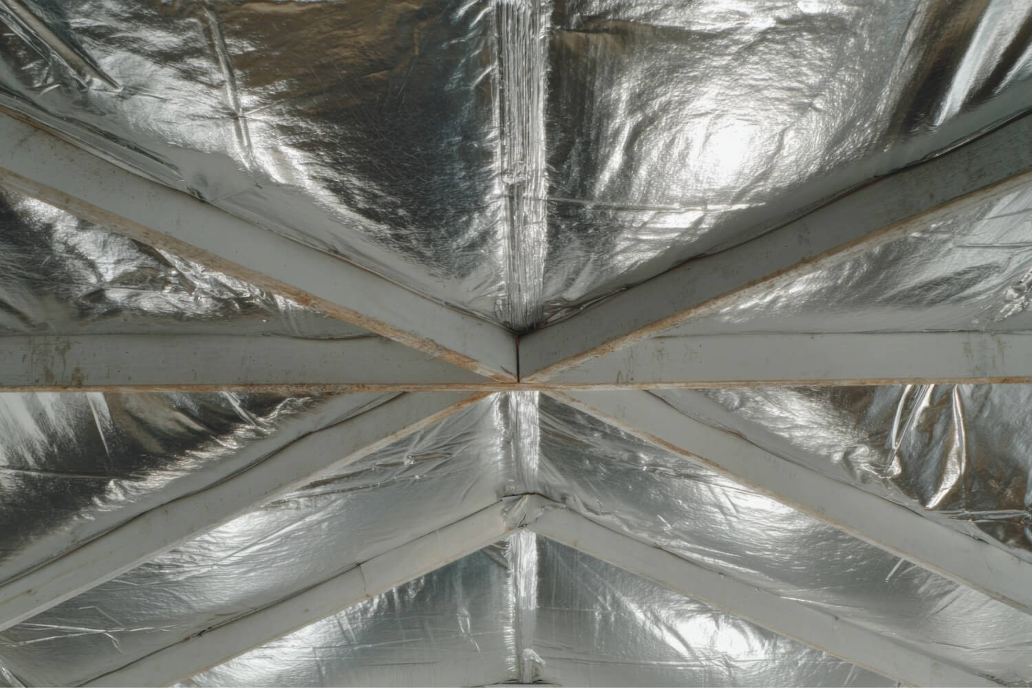 Radiant barrier installed in an attic on the roof