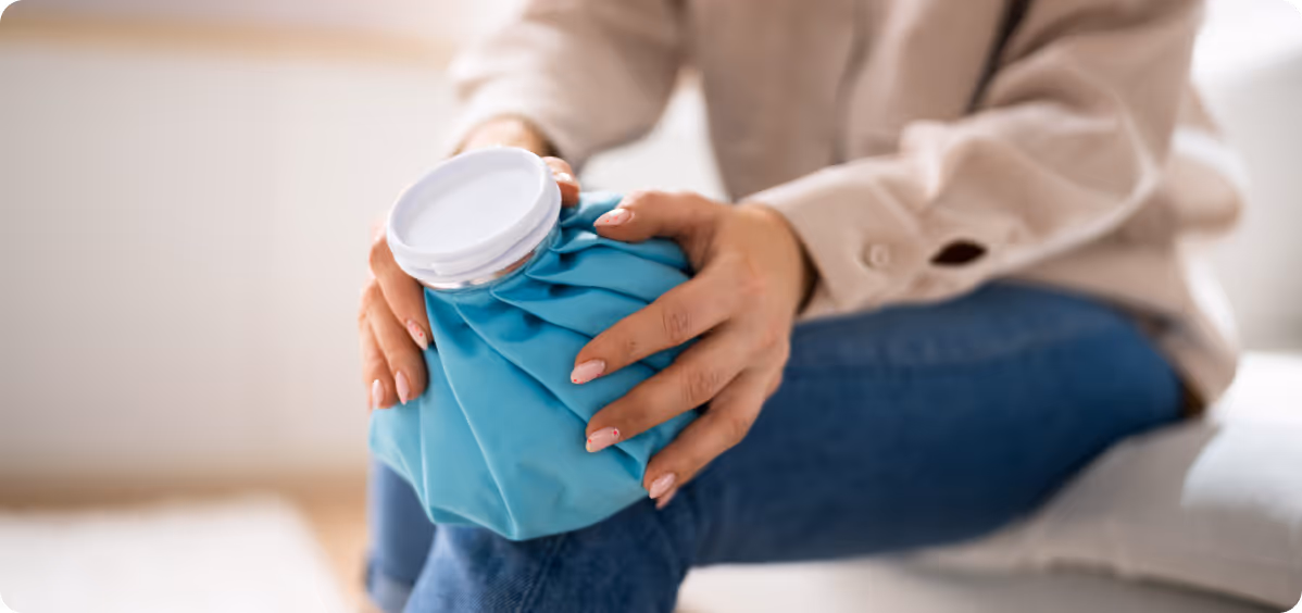 Patient applying ice pack after pain treatment as part of immediate recovery protocol