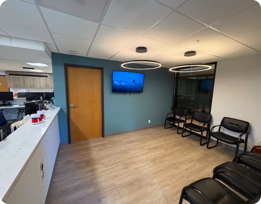 Reception area welcoming patients seeking expert pain relief in Long Beach