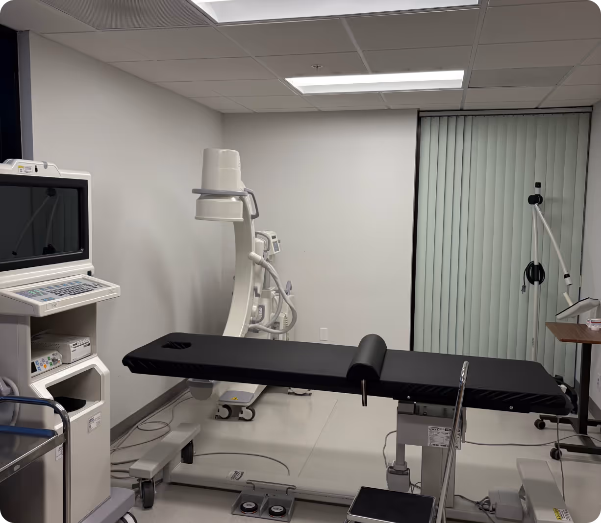 State-of-the-art pain treatment room with medical equipment for managing chronic pain, arthritis, and nerve conditions in Long Beach