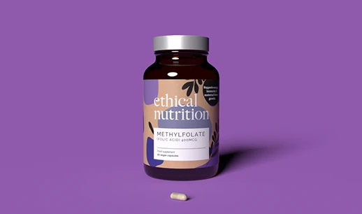 Brown supplement bottle labeled Ethical Nutrition Methylfolate Folic Acid 400mcg on a purple background with one white capsule in front.