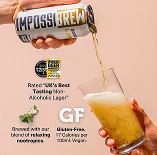 Hand pouring Impossibrew non-alcoholic lager into a glass with text highlighting it as UK's best tasting, gluten-free, 17 calories per 100ml, vegan, and brewed with nootropics.