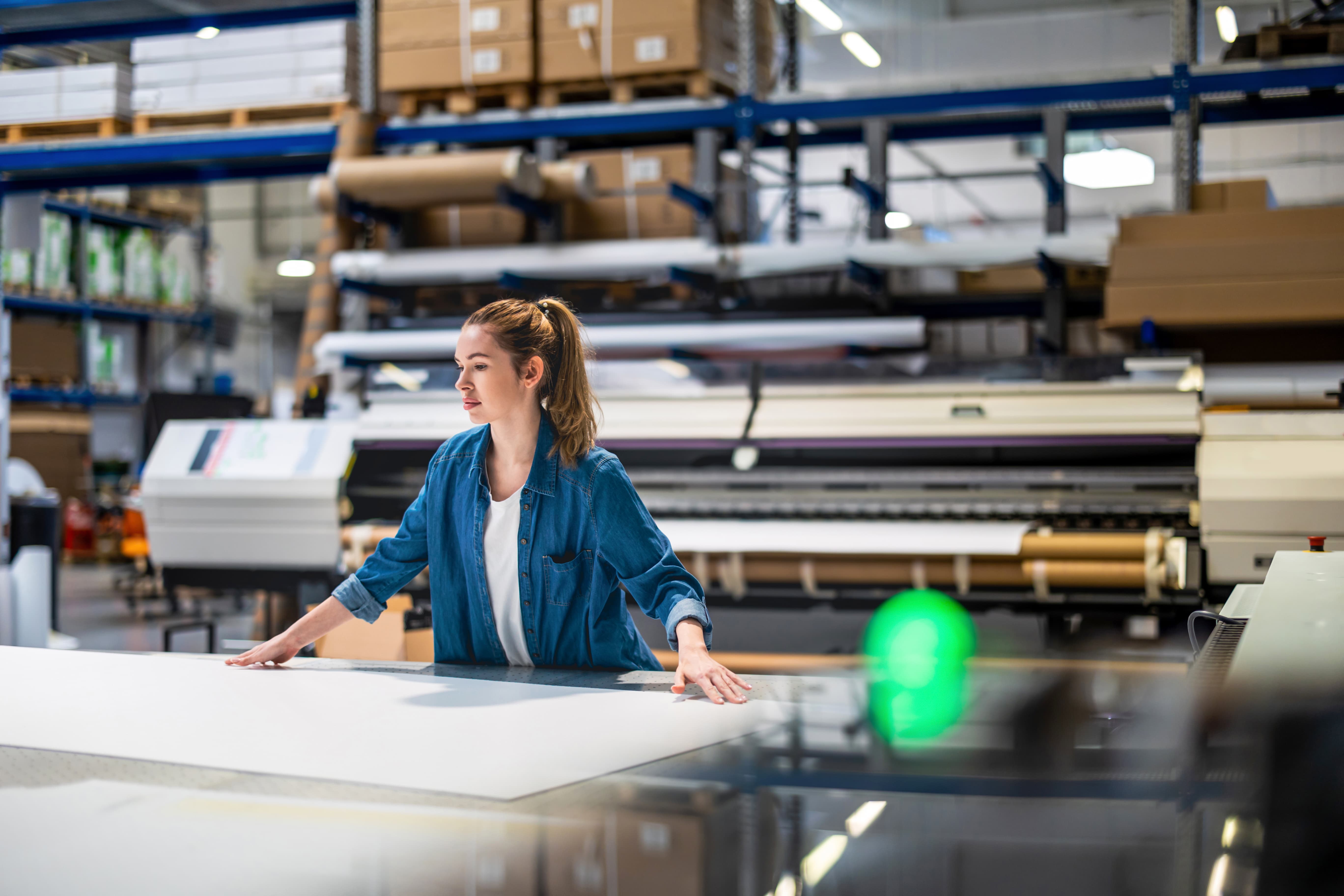 A woman working in a warehouse.
