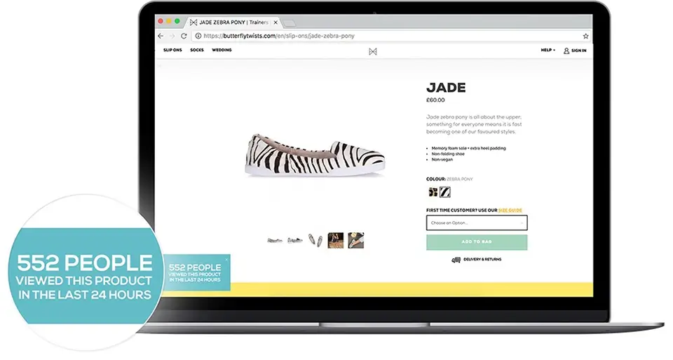 Zebra-print flat shoe on product page with 552 recent views