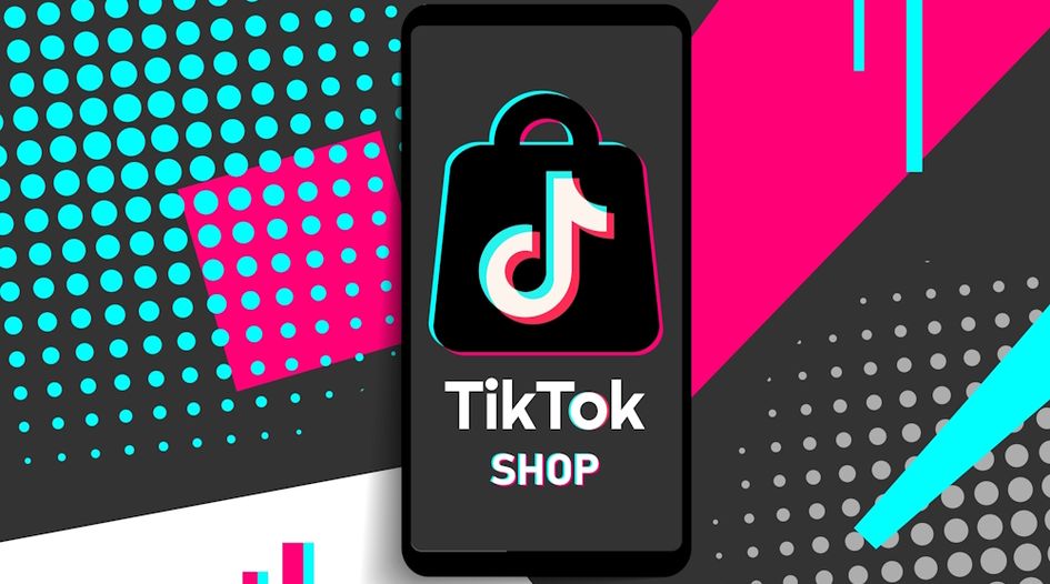 TikTok Shop logo on smartphone with vibrant geometric background
