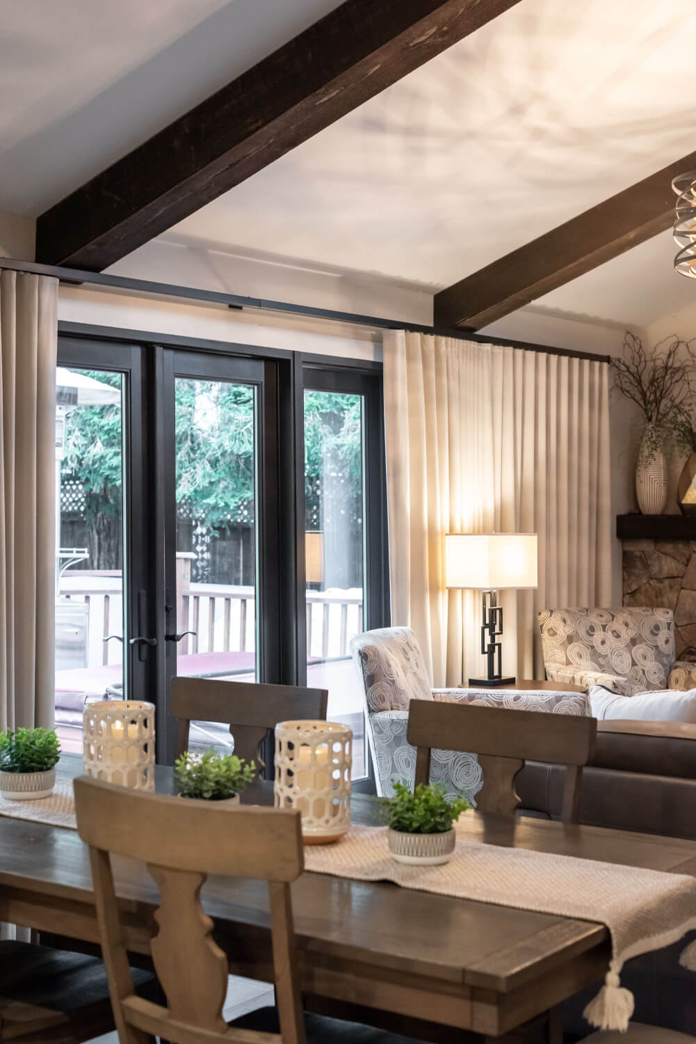 Living room with drapes and side panels