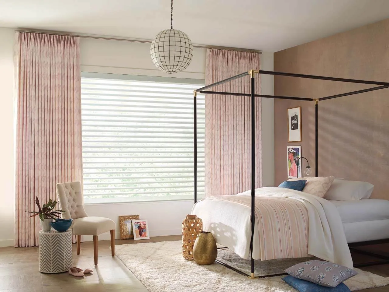 Elegant bedroom with pink drapes and sheer blinds.