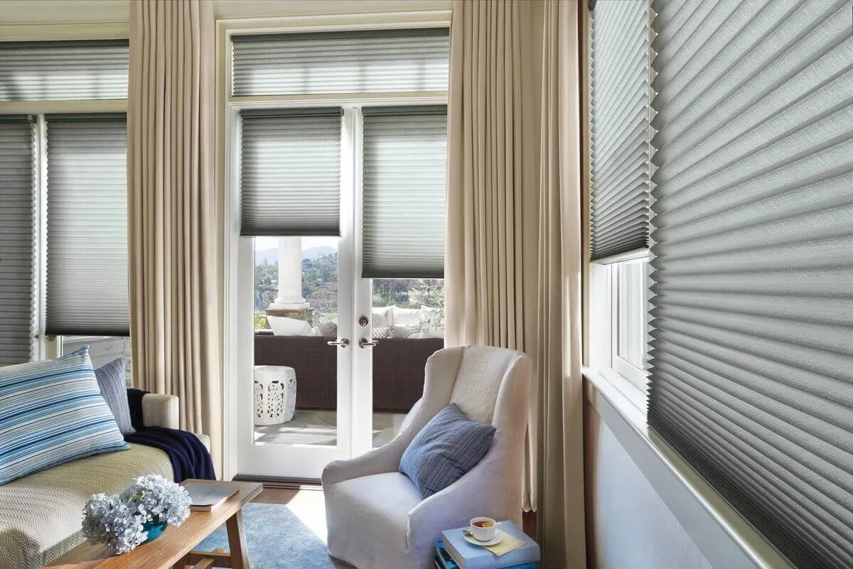 Living room with cellular honeycomb shades.