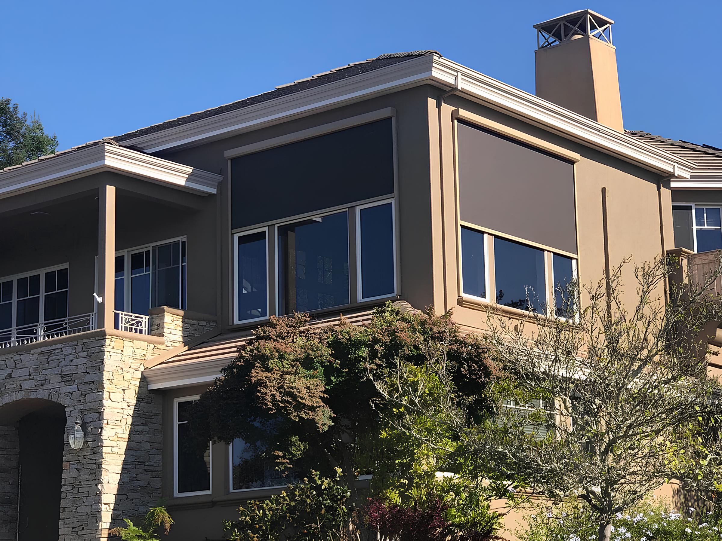 Modern house with exterior solar screens.