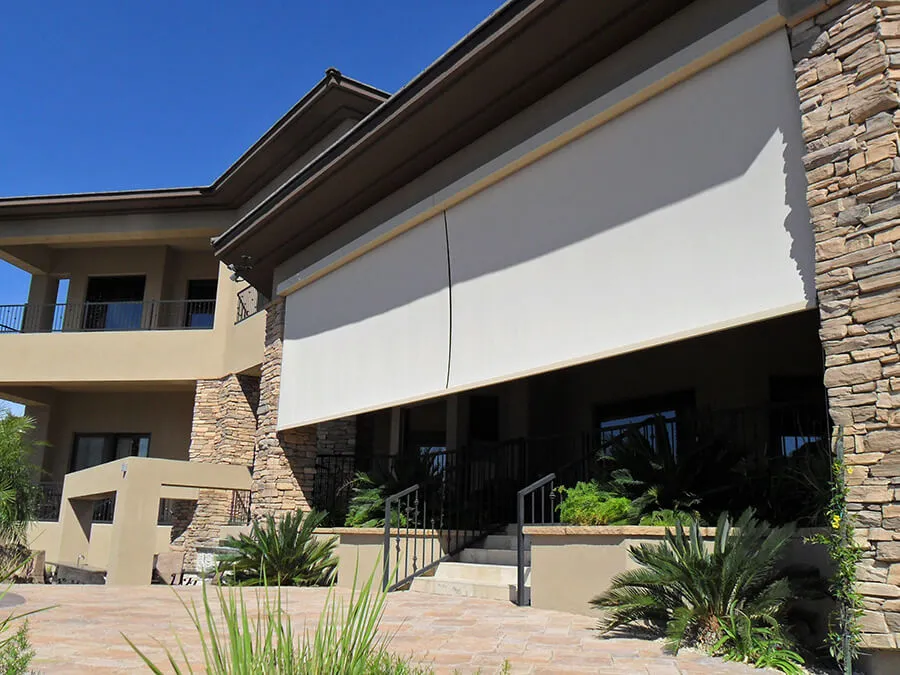House with solar screen blinds outside