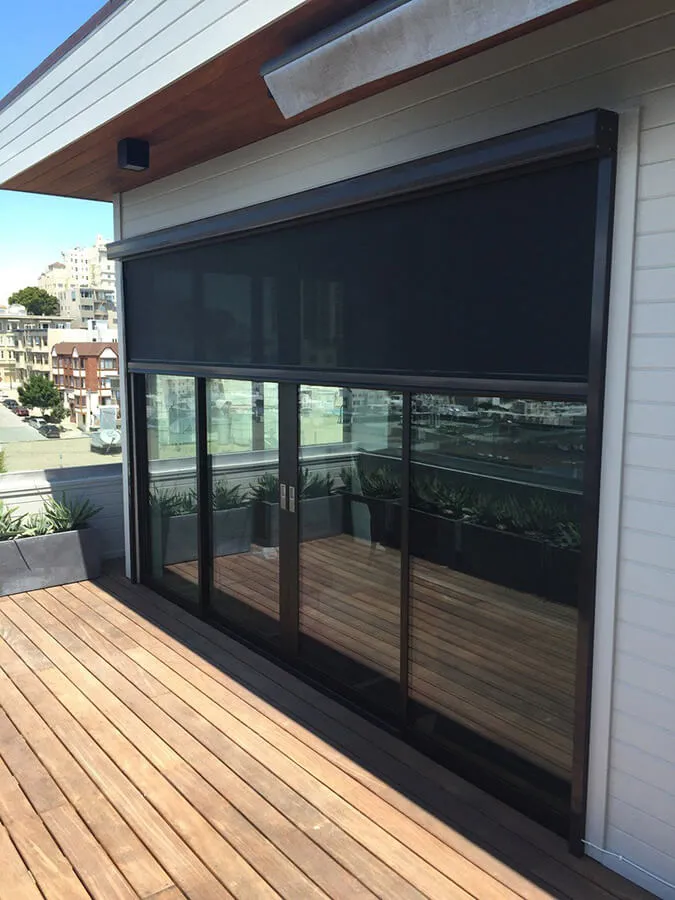 Outdoor solar screen on sliding glass doors, rooftop view, Santa Rosa.