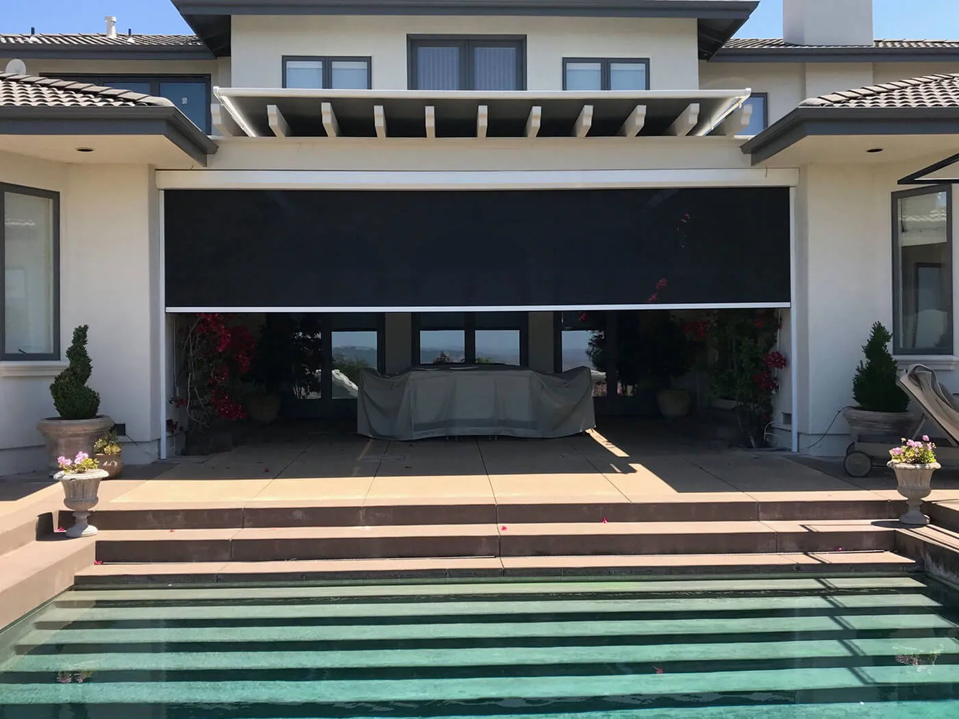 Patio with solar screen and pool