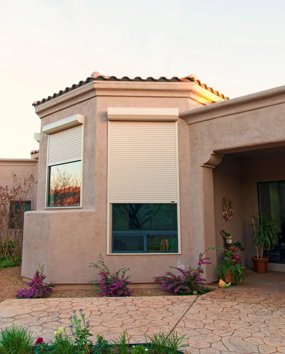 Brown house with rolling shutters on windows, Santa Rosa, CA.