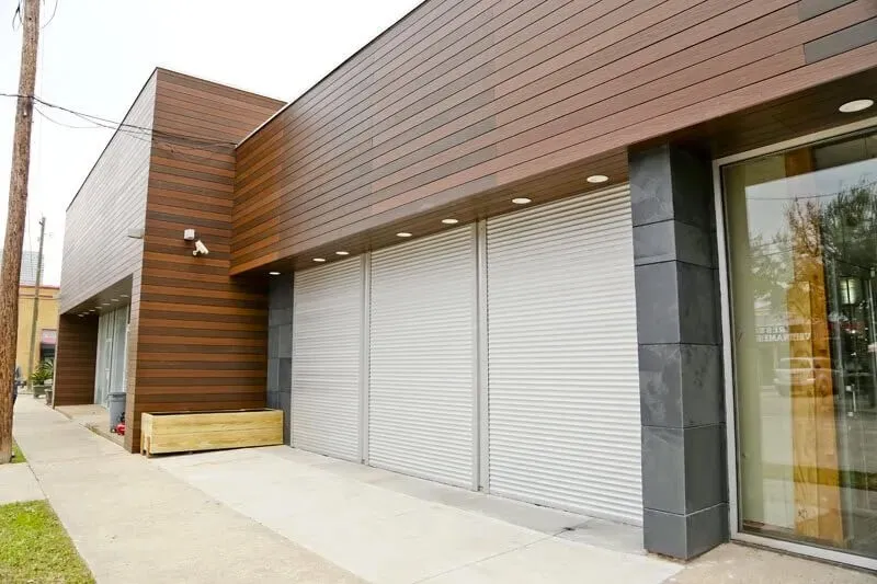 Rolling shutters on building exterior