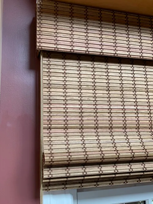 Woven wood shades on a window.