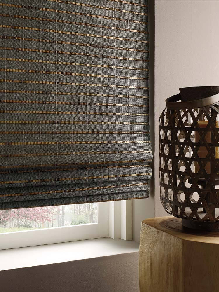 Woven wood shade near basket decor