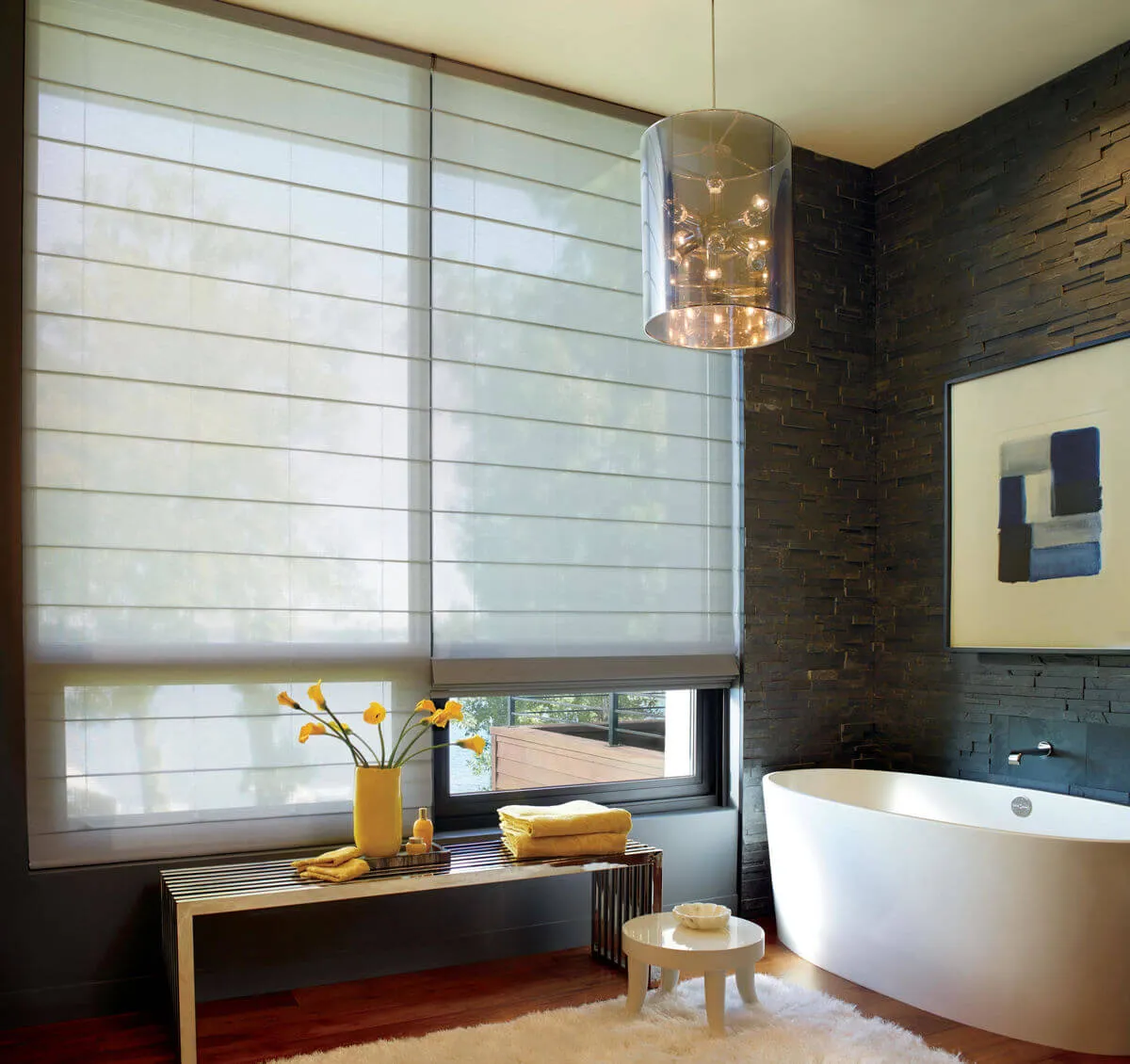 Modern bathroom with large woven wood shades.