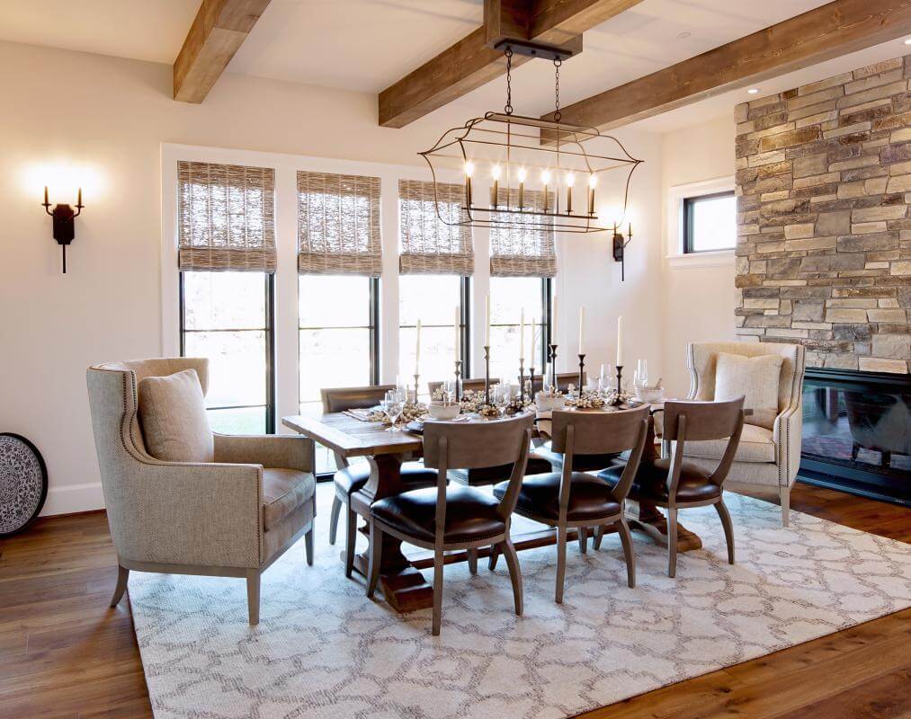 Dining room with woven wood shades.