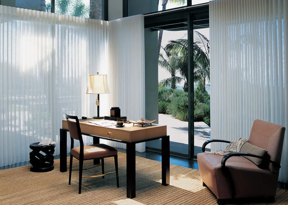 Modern office with glass door blinds.