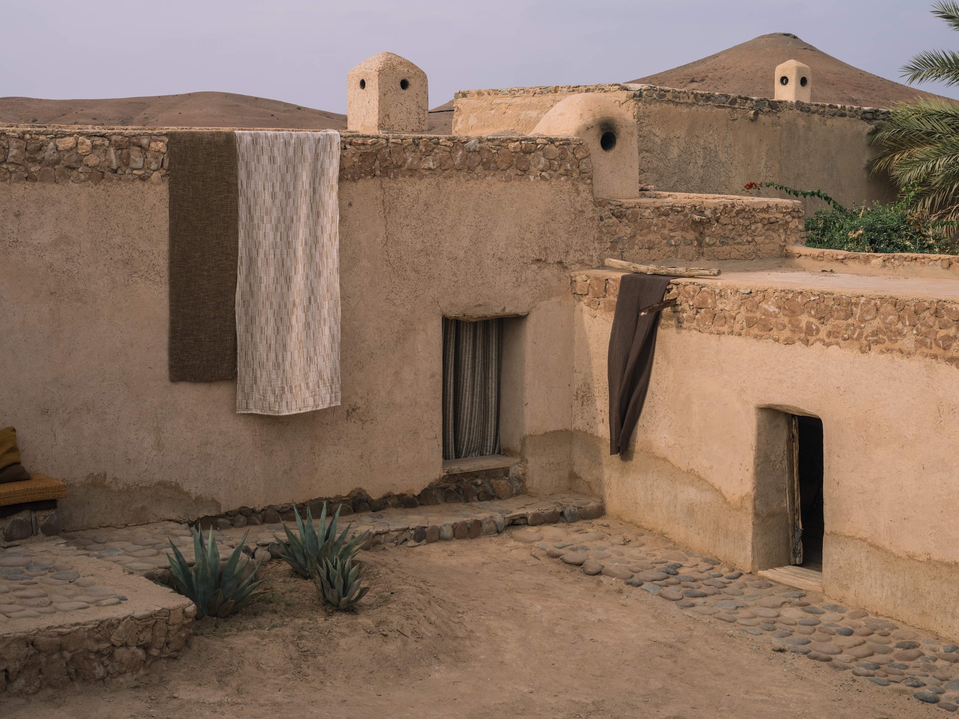 Designs Of The Time is a Belgian company founded in 1998 by the Puylaert family. In their interior textiles, they embrace a sense of imperfection that complements their love for natural materials and casual, untreated looks. The work of this family revolves around a deep love for craftsmanship, authenticity and thoughtful creative designs. This, along with their gentle character, results in interior textile collections of discrete luxury that breathe a troop of warm feelings into every home.