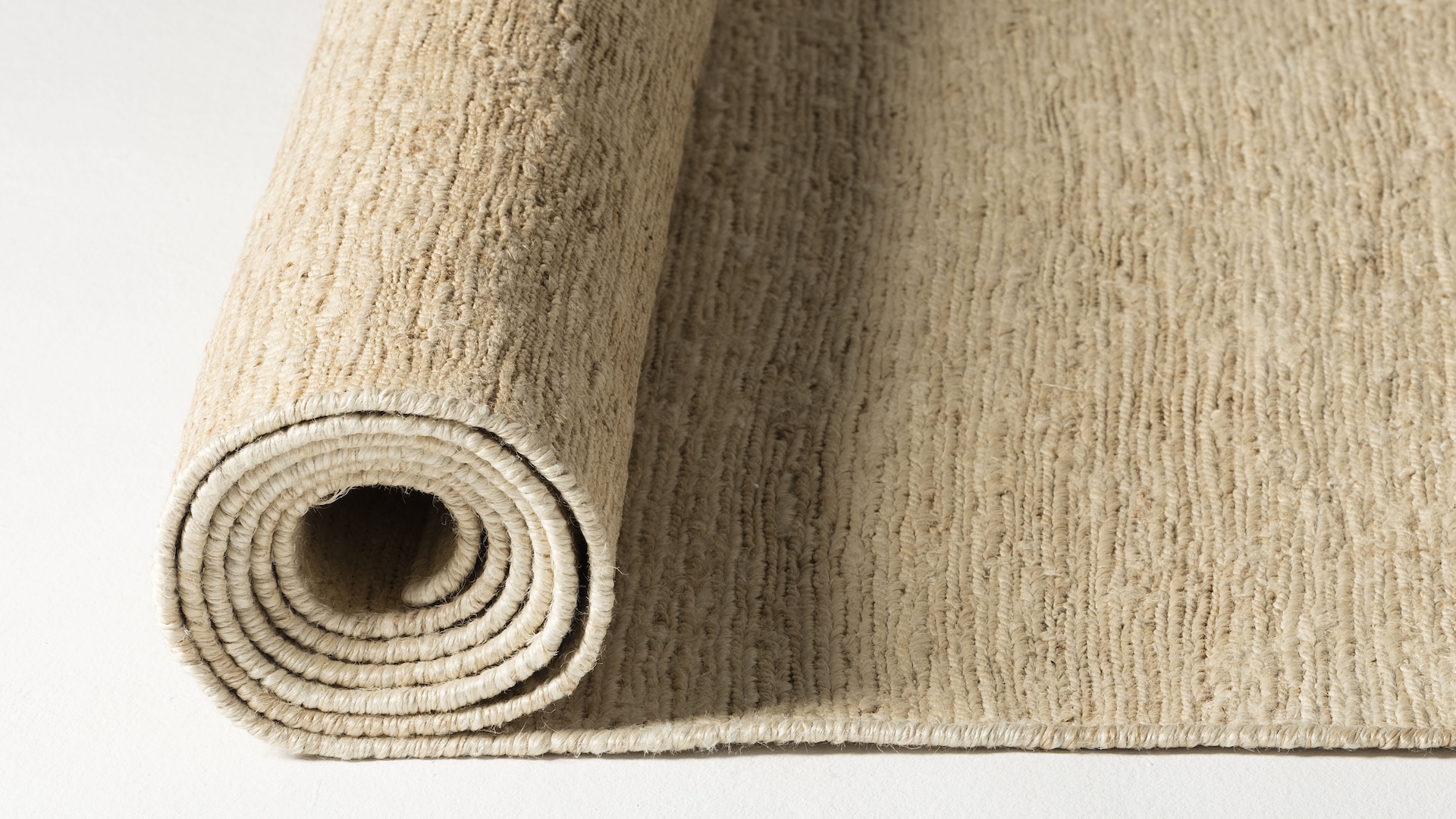 Cumellas designs and produces contemporary handmade rugs. Based in Barcelona since 1992, its work reflects a deep understanding of craftsmanship and a distinctive approach to design. Natural materials, colour and texture are at the core of the brand’s DNA, shaping rugs that respect both the origin of the materials and the social context in which they are made, while emphasising craftsmanship. Alongside its own collections, Cumellas collaborates with artists and designers, bringing new perspectives and expanding the language of rugs into more experimental and expressive territories.