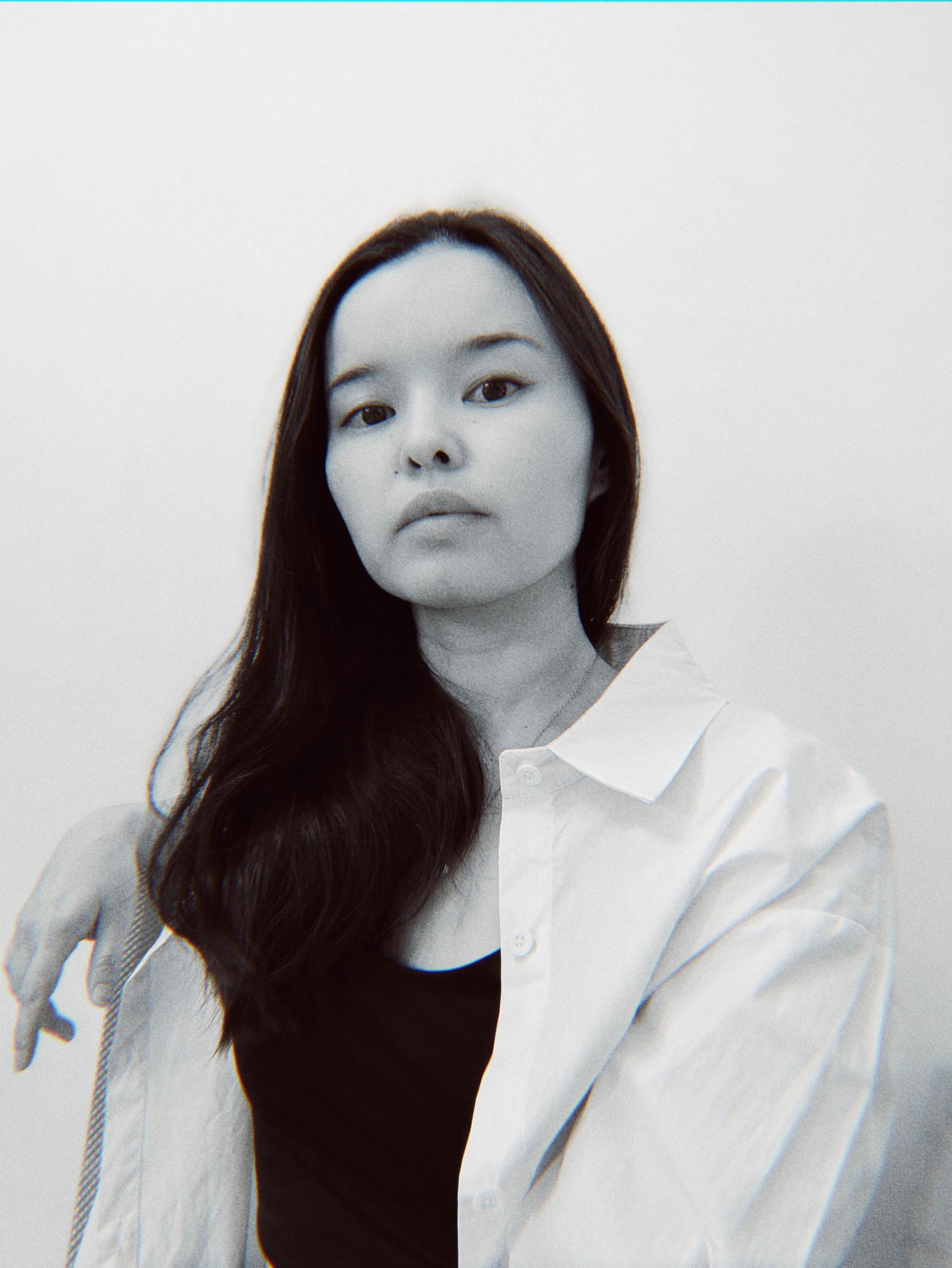 a black and white portrait of Aina